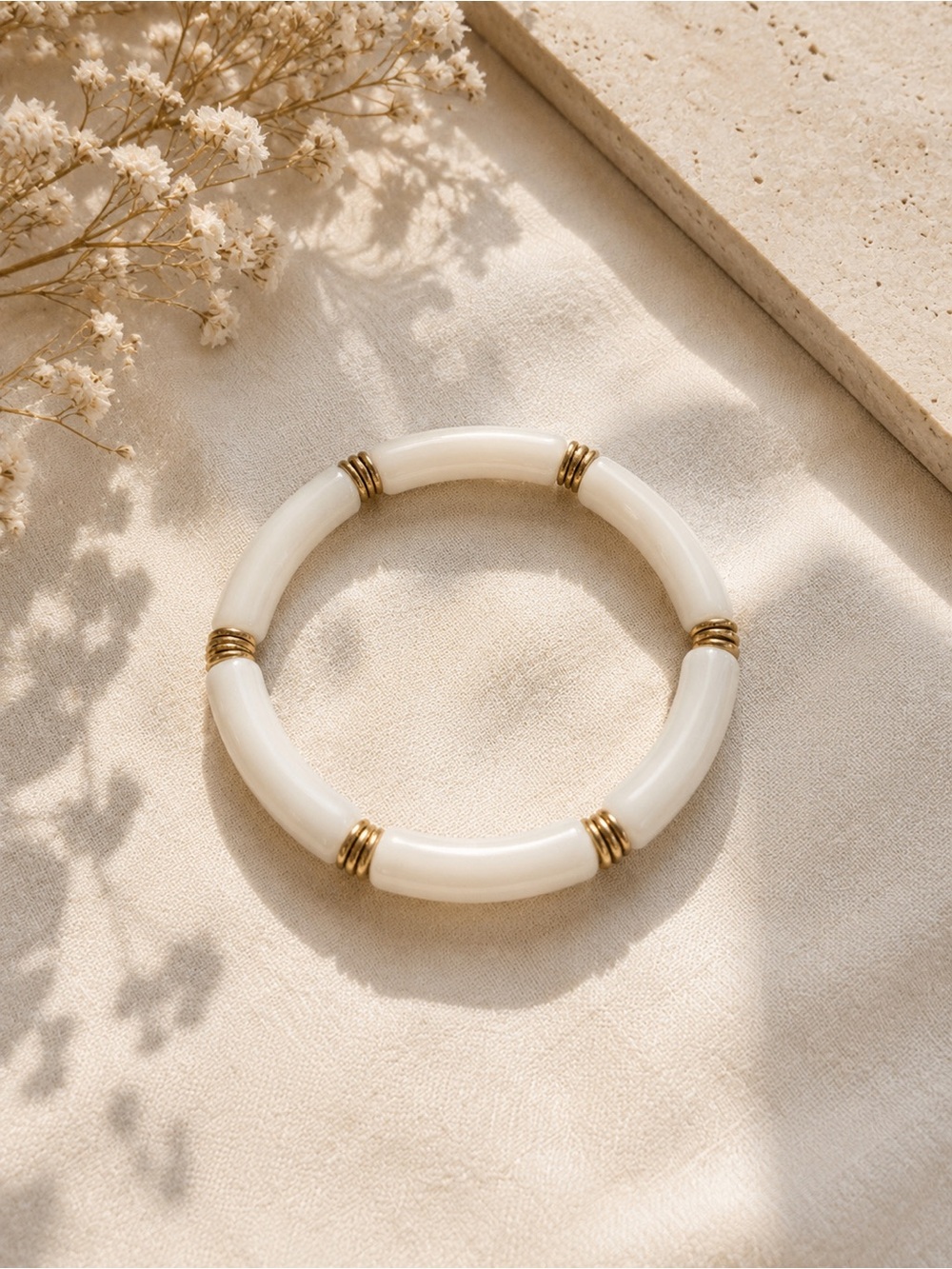 Elegant White and Gold Tubular Bracelet